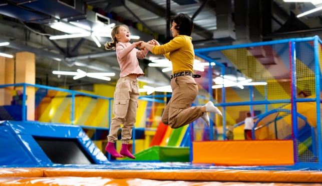 Mother and child on a trampoline